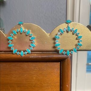 Zuni sterling silver hoop earrings with teardrop-shaped turquoise stones